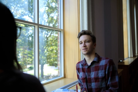 male student by library window SD10196822