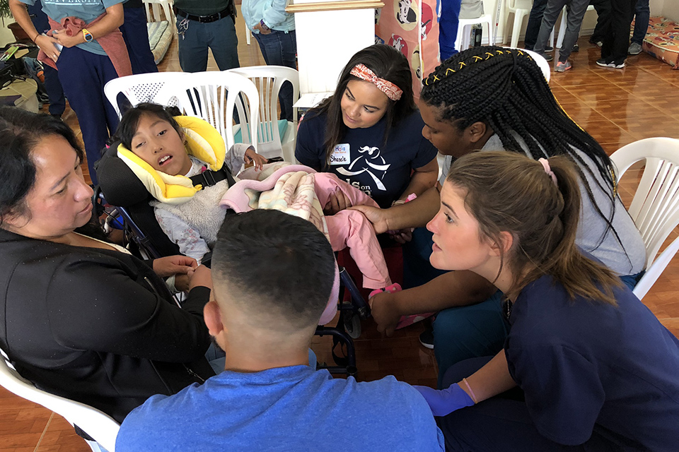 Students working with patients in Ecuador