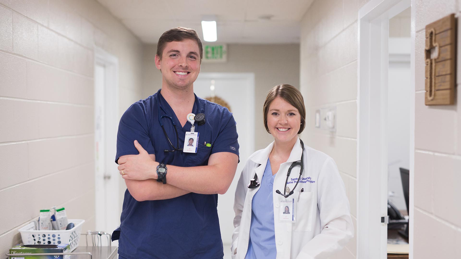male and female nursing students in hallway